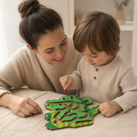 Parent and child playing together with the Crocodile Wooden Maze