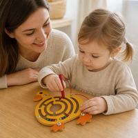 Parent and child playing together with the Duck Wooden Maze