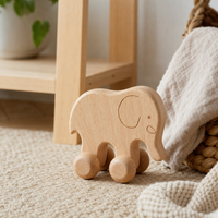 Elephant Push Toy on Wheels in a bright Montessori playroom