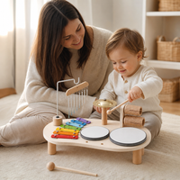 Parent and child playing together with the Music Station 6 Instruments