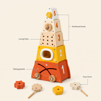 Rocket Stacking Tower 5 Pieces features: Numbered levels, Sliding planets, Lacing holes, Shape blocks