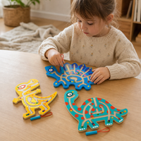 Child playing with the Wooden Dinosaur Maze