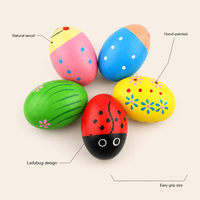 Wooden Musical Egg Shakers features: Natural wood, Hand-painted, Ladybug design, Easy grip size
